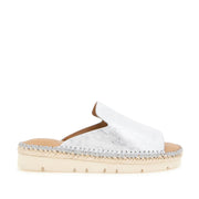 Silver metallic leather espadrille flatform mule with a peep toe. 