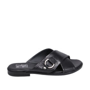 Black slide sandals with criss-cross straps and D-ring buckle detail on a white background